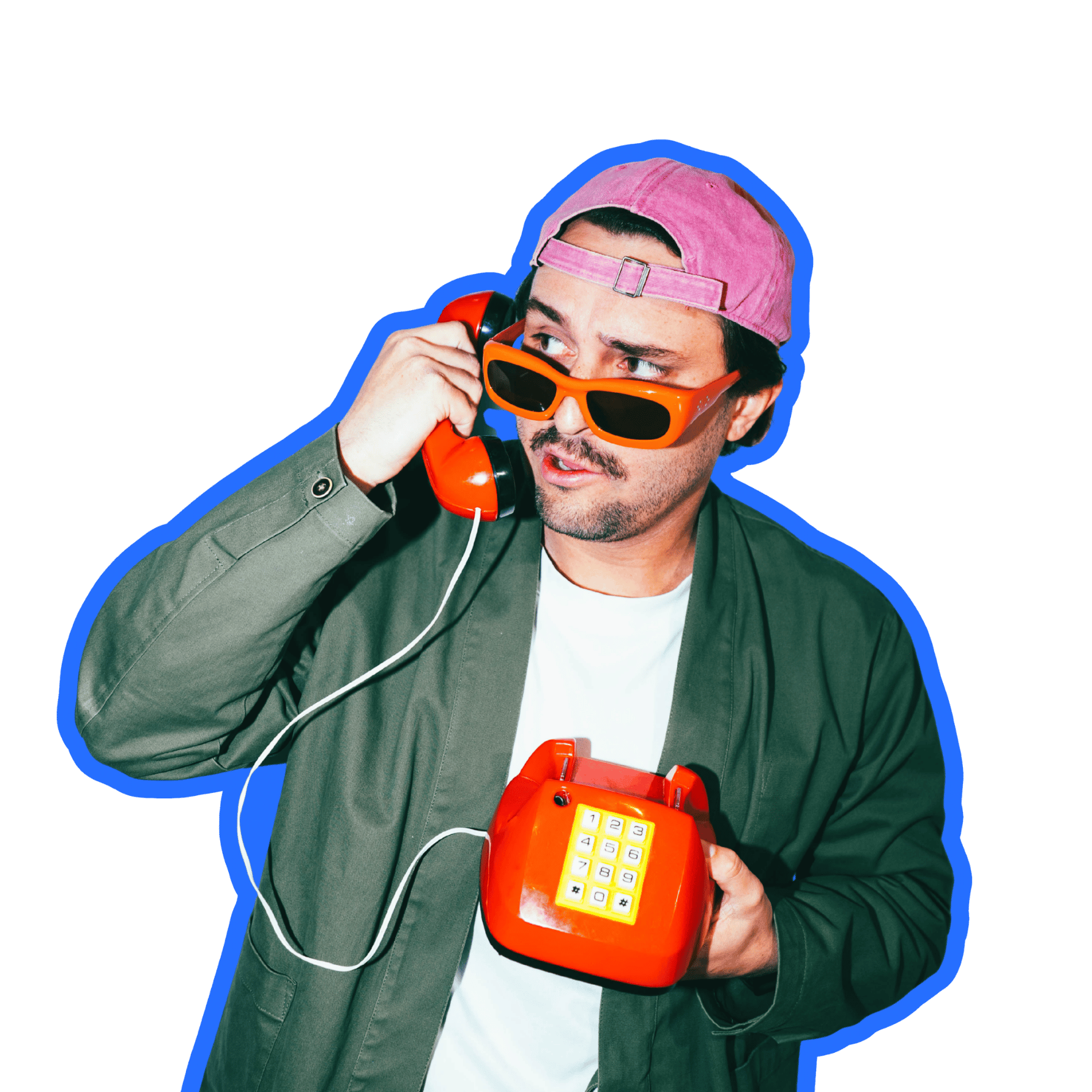 Young man with red sunglasses and a pink cap, holding a red telephone.